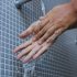 ما حكم غسل اليدين إلى المرفقين دون غسل أصابع اليدين؟